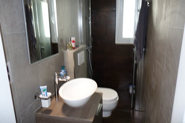 Joli appartement de 4,5 pièces en PPE idéalement situé et au calme vendu à un prix très raisonnable 19