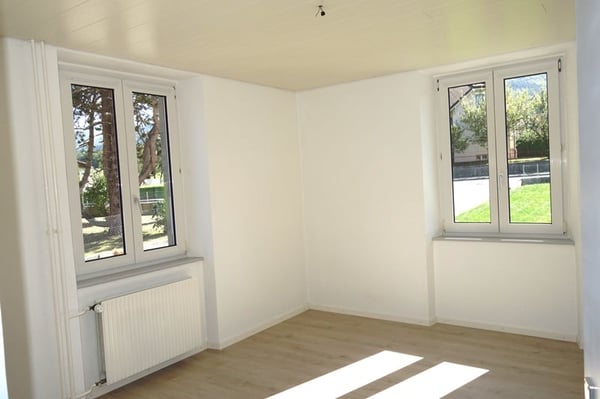 A louer charmant appartement de 3,5 pièces au rez-de-chaussée d'un petit immeuble 2