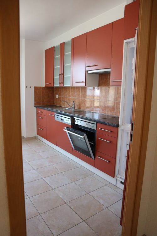 4 pièces dans petit immeuble locatif 3