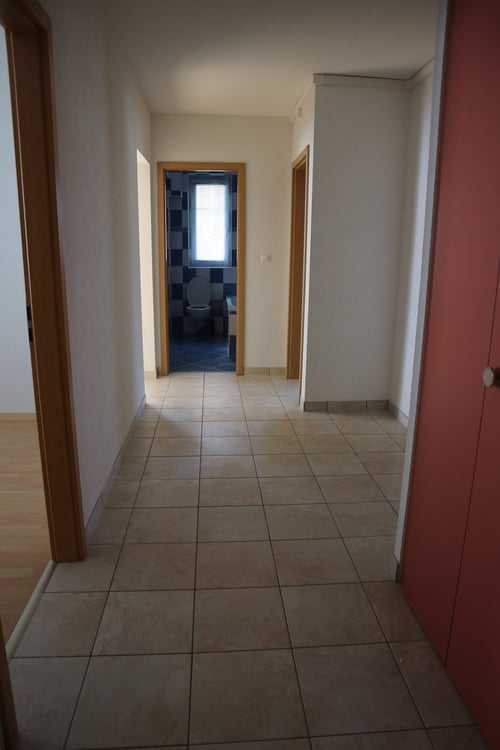 4 pièces dans petit immeuble locatif 5