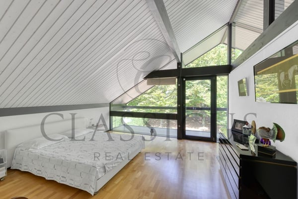 Villa lumineuse et moderne avec jardin arboré, à lisière du Golf de Genève 5