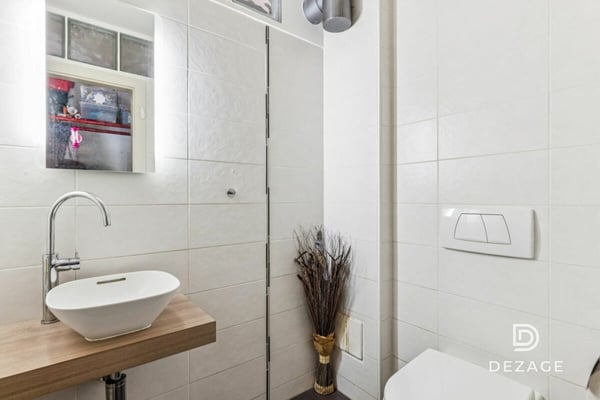 Appartement à rénover avec potentiel de transformation, situé au centre du village ! 8