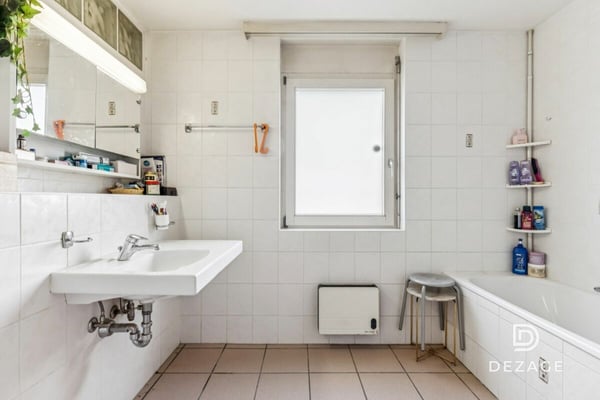 Appartement à rénover avec potentiel de transformation, situé au centre du village ! 10