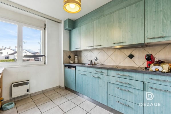 Appartement à rénover avec potentiel de transformation, situé au centre du village ! 4