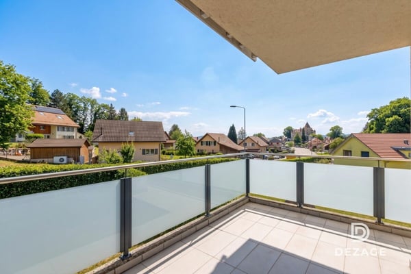 Grand appartement familial avec balcon couvert et vue sur le château d'Oron ! 4