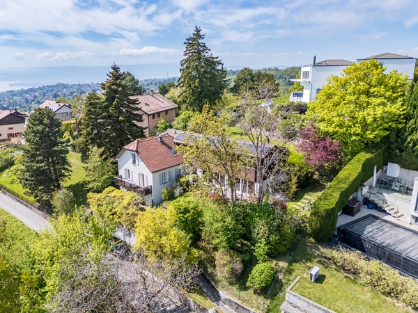 Grande villa lumineuse avec vue lac et rendement locatif 4