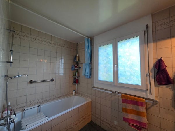 Appartement lumineux de 5,5 pièces avec ascenseur et garage 8