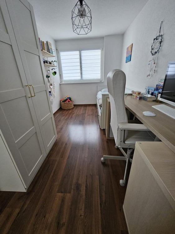 Bel appartement de 3,5 pièces, bénéficiant d'un jardin privatif et d'une place de parc intérieure 5