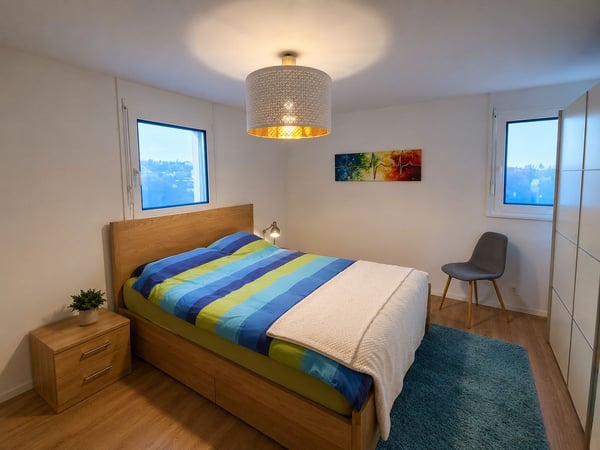 Appartement en attique avec terrasse, garage double et place de parc extérieure 6