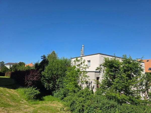 Appartement en attique avec terrasse, garage double et place de parc extérieure 2