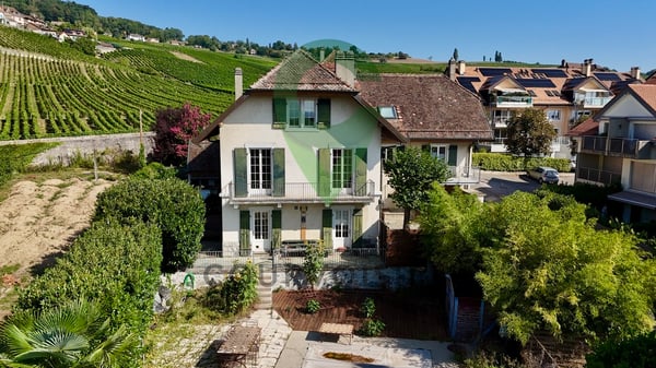 Au coeur du village de Fechy, bel immeuble de 4 logements 1