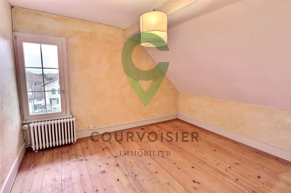 Au coeur du village de Fechy, bel immeuble de 4 logements 9