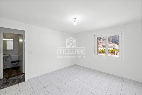 Opportunité à saisir - Spacieux 4,5 pièces lumineux au coeur du village 9