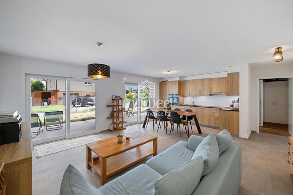Charmant 3,5 pièces avec terrasse, jardin et deux places de parc