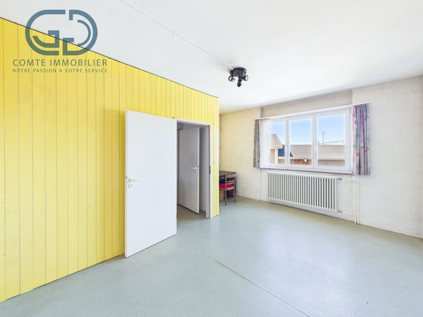 Maison contiguë de 5.5 pièces avec jardin, garage et beau potentiel 7