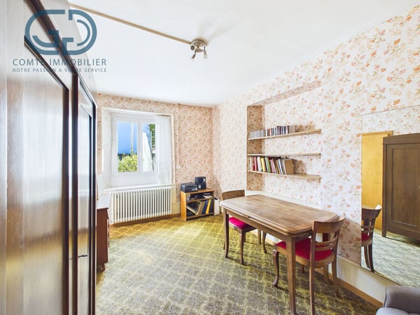 Maison contiguë de 5.5 pièces avec jardin, garage et beau potentiel 5