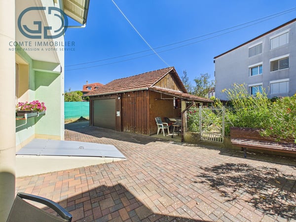 Maison contiguë de 5.5 pièces avec jardin, garage et beau potentiel 13