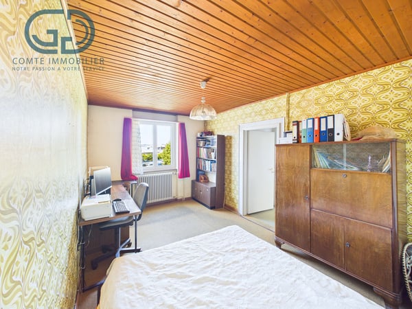 Maison contiguë de 5.5 pièces avec jardin, garage et beau potentiel 6