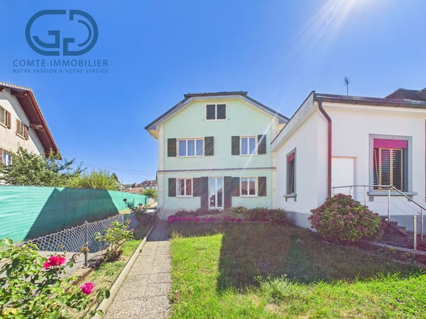 Maison contiguë de 5.5 pièces avec jardin, garage et beau potentiel 1
