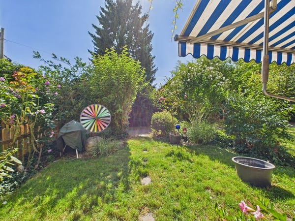 Familienfreundliches Reihenfamilienhaus mit Sonnigem Garten 10