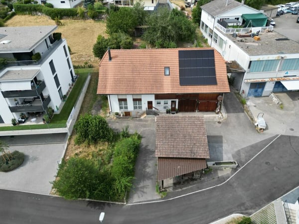 Mehrfamilienhaus mit Bauland an attraktiver Lage 6