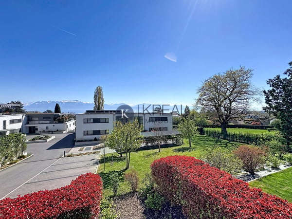 Cadre de vie privilégié : 4,5 pièces moderne avec balcon et vue exceptionnelle sur le lac 10
