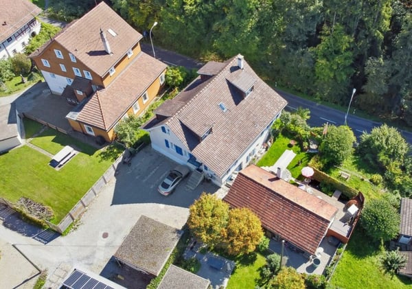 Einfamilienhaus mit Einliegerwohnung und Studio: Ideal für Eigennutzung, Kapitalanlage oder beides 1