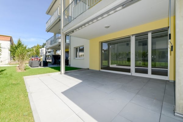 Moderne helle Wohnung mit Gartensitzplatz 2