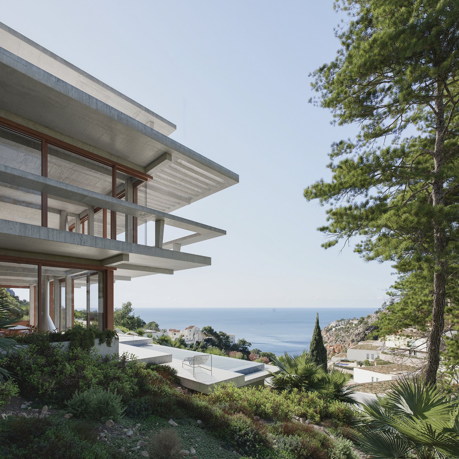 Modern house, concrete structure, glass windows, elevated position, sea view