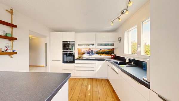 Zwei Wohnungen in einer: 4 Zimmer, Sauna und zwei Balkone gegen Süden 12