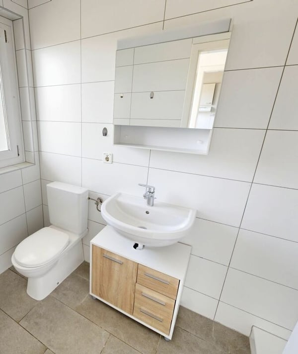 ATTRAKTIVE 2.5-ZIMMER-WOHNUNG IN MÜNTSCHEMIER 5