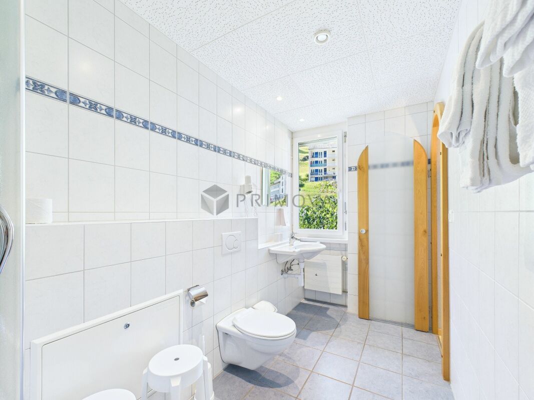 Hotel & Restaurant mit Einliegerwohnungen, Rebberg und Bauland in Premiumlage am Walensee