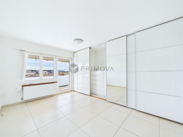 Exklusives Doppeleinfamilienhaus mit grosszügigem Wohnkonzept an ruhiger Lage 6