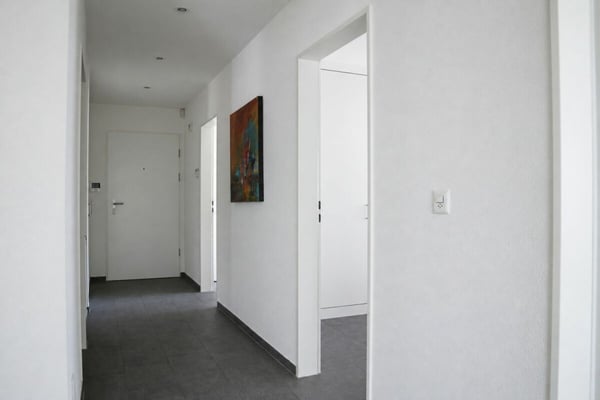 4.5-Zimmer-Eigentumswohnung mit ausgebautem Bastelraum und 2 TG-PP 12