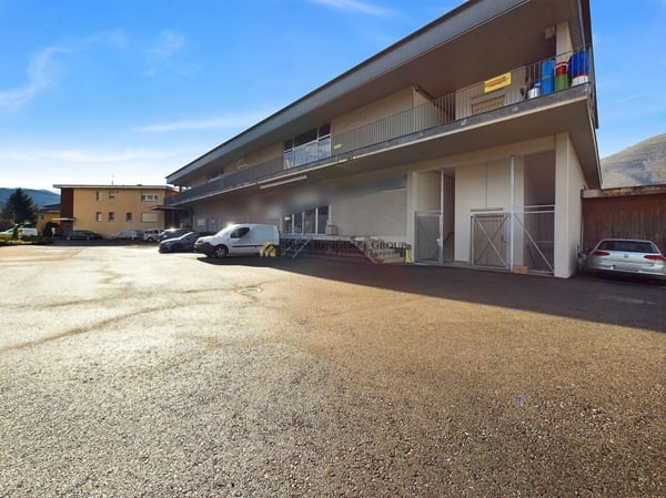 Wohn- und Gewerbeimmobilie in Lamone  Investitionshighlight in optimaler Lage! 2