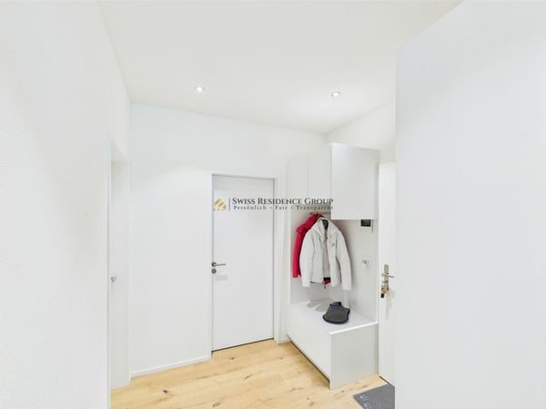 RESERVIERT! Lichtdurchflutete 1.5- Zimmer-Gartenwohnung mit 2,7m Deckenhöhe, Bergsicht und hochwertiger Ausstattung 11