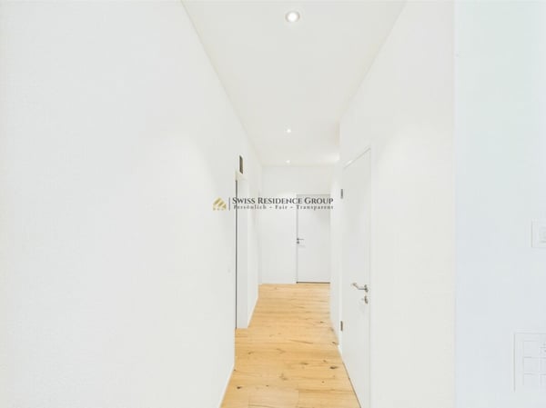 RESERVIERT! Lichtdurchflutete 1.5- Zimmer-Gartenwohnung mit 2,7m Deckenhöhe, Bergsicht und hochwertiger Ausstattung 10