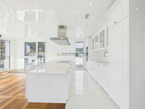 Traumhafte Attika mit Bergsicht - Exklusives Wohnjuwel 2