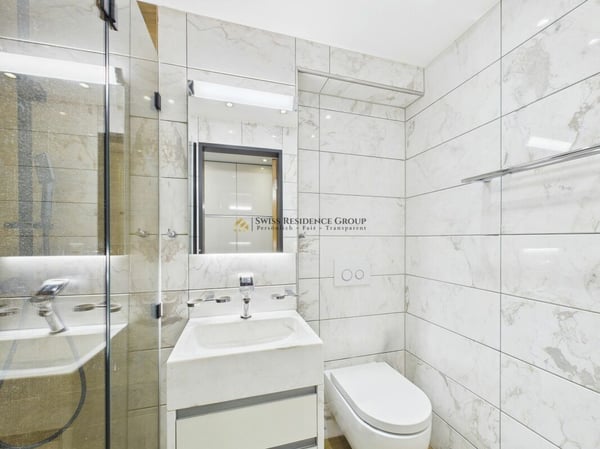 Einzigartige 1.5-Zimmer Wohnung mit Teilseeblick und Pool 9