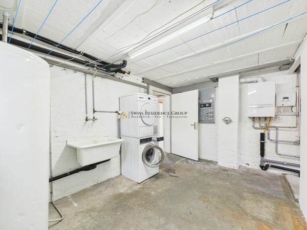 Vielfältiges Einfamilienhaus mit Gewerbemöglichkeit und Autolift 8