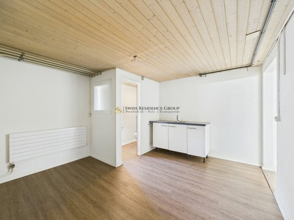 Vielfältiges Einfamilienhaus mit Gewerbemöglichkeit und Autolift 9