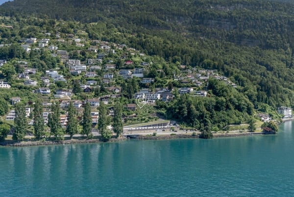 Einzigartiges Bauland mit Traumblick zu den Bergen und auf den See 1