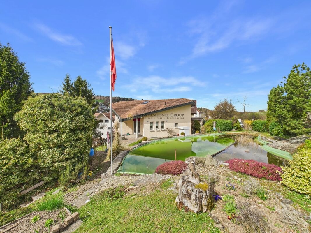 Einfamilienhaus mit grossem Grundstück & angrenzender Landwirtschaftsparzelle