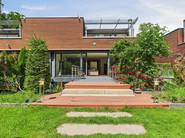Traumhaftes Doppelfamilienhaus: Luxus, Natur und Exklusivität auf höchstem Niveau 2