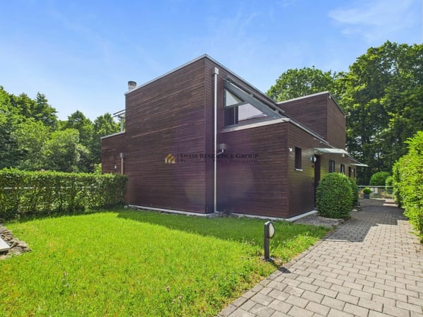 Traumhaftes Doppelfamilienhaus: Luxus, Natur und Exklusivität auf höchstem Niveau 3