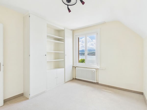 Einfamilienhaus mit Charme, Gartenterrassen und herrlichem Seeblick 9