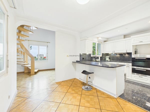 Exklusives 6.5-Zimmer-Einfamilienhaus mit grosszügigem Garten 5
