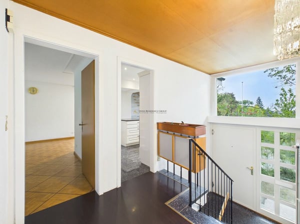 Exklusives 6.5-Zimmer-Einfamilienhaus mit grosszügigem Garten 9