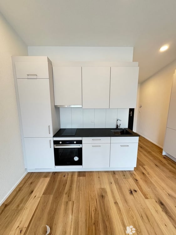 Modernes Wohnen im Neubau: 1.5-Zimmer-Wohnung mit Balkon im 3. OG 1