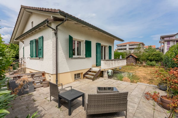 MAISON INDIVIDUELLE AVEC GARAGE BOX ET COUVERT A VOITURE 1